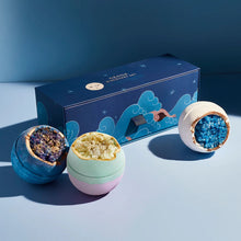 Load image into Gallery viewer, Miss Patisserie Geode Discovery bath bomb gift set. Contains three bath bombs. Picture shows all three alongside a lovely gift box. Vegan and cruelty-free. Available at Lovethical along with plenty of other vegan and cruelty-free beauty products, makeup, make up, toiletries and cosmetics for all your gift and present needs. 
