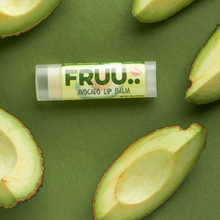 Load image into Gallery viewer, Fruu avocado lip balm. Picture shows the balm along with some avocados. Vegan and cruelty-free. Available at Lovethical along with plenty of other vegan and cruelty-free beauty products, makeup, make up, toiletries and cosmetics for all your gift and present needs. 

