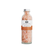 Load image into Gallery viewer, Bloomtown Himalayan salt soak glass bottle - The Grove - blood orange and pink grapefruit. Vegan and cruelty-free. Available at Lovethical along with plenty of other vegan and cruelty-free beauty products, makeup, make up, toiletries and cosmetics for all your gift and present needs. 
