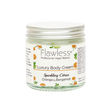 Load image into Gallery viewer, Flawless body cream - sparkling citrus. Image shows a close-up on the product in a glass pot and aluminium lid. Vegan and cruelty-free. Available at Lovethical along with plenty of other vegan and cruelty-free beauty products, makeup, make up, toiletries and cosmetics for all your gift and present needs. 
