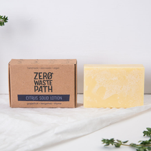 Load image into Gallery viewer, Zero Waste Path citrus solid lotion. Vegan and cruelty-free. Available at Lovethical along with plenty of other vegan and cruelty-free beauty products, makeup, make up, toiletries and cosmetics for all your gift and present needs. 
