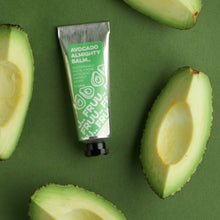 Load image into Gallery viewer, Image of Fruu&#39;s almighty avocado balm surrounded by bits of cut up avocado and a vibrant green background. Vegan and cruelty-free. Available at Lovethical along with plenty of other vegan and cruelty-free beauty products, makeup, make up, toiletries and cosmetics for all your gift and present needs. 
