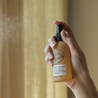 Close up picture of someone spraying UpCircle face toner into the air. Vegan and cruelty-free. Available at Lovethical along with plenty of other vegan and cruelty-free beauty products, makeup, make up, toiletries and cosmetics for all your gift and present needs. 