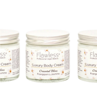 Flawless body cream - oriental bliss. Image shows a close-up of the product in a glass jar and aluminium lid. Vegan and cruelty-free. Available at Lovethical along with plenty of other vegan and cruelty-free beauty products, makeup, make up, toiletries and cosmetics for all your gift and present needs. 