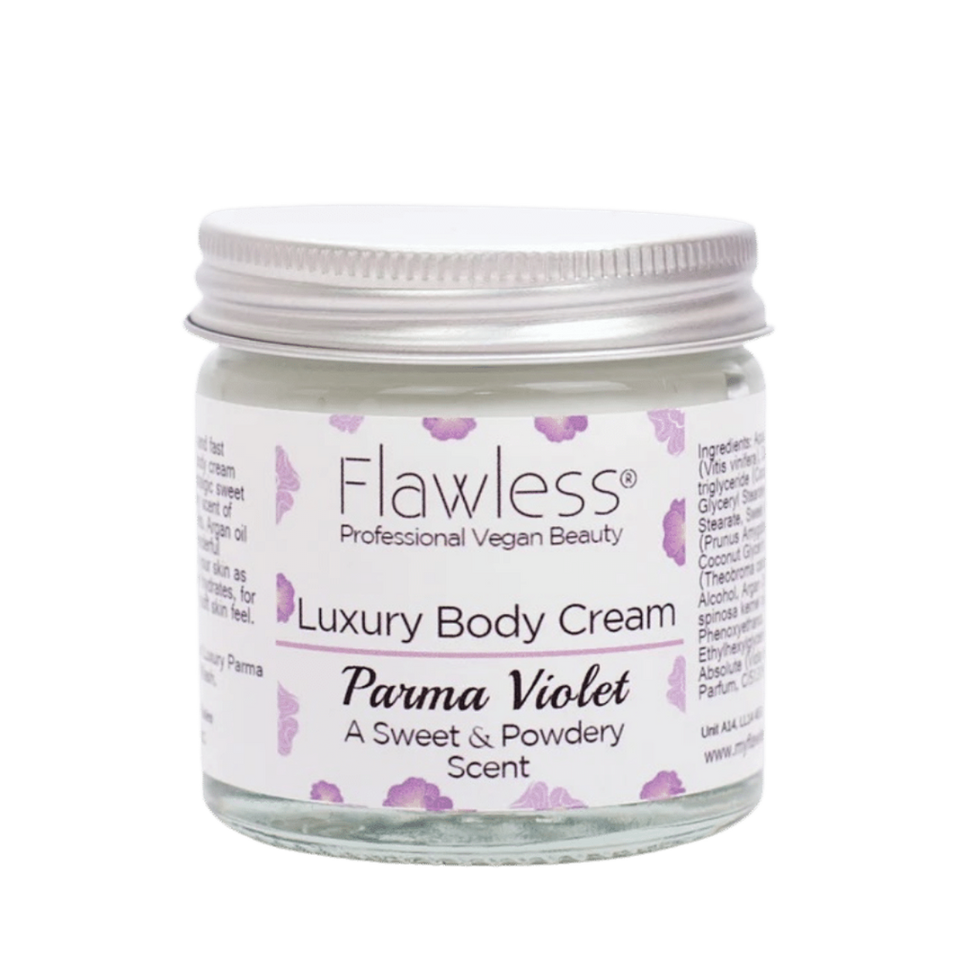 Flawless body cream - parma violet. Image shows a close-up of the product in a glass jar and aluminium lid. Vegan and cruelty-free. Available at Lovethical along with plenty of other vegan and cruelty-free beauty products, makeup, make up, toiletries and cosmetics for all your gift and present needs. 