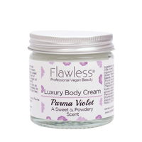 Flawless body cream - parma violet. Image shows a close-up of the product in a glass jar and aluminium lid. Vegan and cruelty-free. Available at Lovethical along with plenty of other vegan and cruelty-free beauty products, makeup, make up, toiletries and cosmetics for all your gift and present needs. 