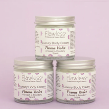 Load image into Gallery viewer, Flawless body cream - parma violet. Image shows three of the products. Vegan and cruelty-free. Available at Lovethical along with plenty of other vegan and cruelty-free beauty products, makeup, make up, toiletries and cosmetics for all your gift and present needs. 
