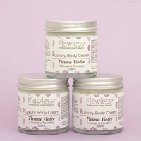 Flawless body cream - parma violet. Image shows three of the products. Vegan and cruelty-free. Available at Lovethical along with plenty of other vegan and cruelty-free beauty products, makeup, make up, toiletries and cosmetics for all your gift and present needs. 