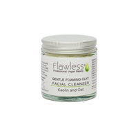 Flawless gentle foaming clay facial cleanser. Image shows a close-up of the product in a glass jar and aluminium lid. Vegan and cruelty-free. Available at Lovethical along with plenty of other vegan and cruelty-free beauty products, makeup, make up, toiletries and cosmetics for all your gift and present needs. 