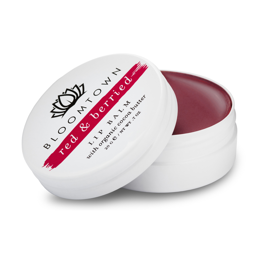 Bloomtown lip balm red and berried tin. Vegan and cruelty-free. Available at Lovethical along with plenty of other vegan and cruelty-free beauty products, makeup, make up, toiletries and cosmetics for all your gift and present needs. 