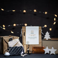 Load image into Gallery viewer, Moonie eco grooming gift set. Vegan and cruelty-free. There are fairy lights and Christmas decorations included in the picture. Available at Lovethical along with plenty of other vegan and cruelty-free beauty products, makeup, make up, toiletries and cosmetics for all your gift and present needs. 

