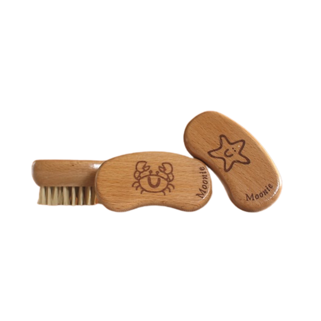 Moonie nail brush. Vegan and cruelty-free. Image shows 3 of the nail brushes. Available at Lovethical along with plenty of other vegan and cruelty-free beauty products, makeup, make up, toiletries and cosmetics for all your gift and present needs. 