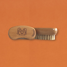 Load image into Gallery viewer, Moonie nail brush. Vegan and cruelty-free. Image shows the nail brush with the image of a smiling crab on the top. Available at Lovethical along with plenty of other vegan and cruelty-free beauty products, makeup, make up, toiletries and cosmetics for all your gift and present needs. 

