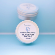 Load image into Gallery viewer, Flawless nose balm for dogs - soothing and nourishing. Image shows a close-up of the product. Vegan and cruelty-free. Available at Lovethical along with plenty of other vegan and cruelty-free beauty products, makeup, make up, toiletries and cosmetics for all your gift and present needs. 
