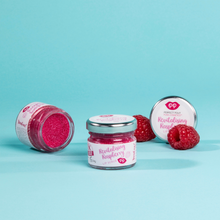 Load image into Gallery viewer, Several glass pots of Pura Cosmetics revitalising raspberry lip scrub with raspberries. Vegan and cruelty-free. Available at Lovethical along with plenty of other vegan and cruelty-free beauty products, makeup, make up, toiletries and cosmetics for all your gift and present needs. 

