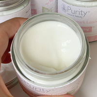 Close-up picture of an open pot of Purity's Scar and Stretchmark Lotion, showing its creamy consistency. Vegan and cruelty-free. Available at Lovethical along with plenty of other vegan and cruelty-free beauty products, makeup, make up, toiletries and cosmetics for all your gift and present needs. 