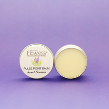 Load image into Gallery viewer, Flawless relaxing pulse point balm - sweet dreams. Image shows two tins of balm, one open and one closed, with a purple background. Vegan and cruelty-free. Available at Lovethical along with plenty of other vegan and cruelty-free beauty products, makeup, make up, toiletries and cosmetics for all your gift and present needs. 
