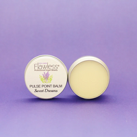Flawless relaxing pulse point balm - sweet dreams. Image shows two tins of balm, one open and one closed, with a purple background. Vegan and cruelty-free. Available at Lovethical along with plenty of other vegan and cruelty-free beauty products, makeup, make up, toiletries and cosmetics for all your gift and present needs. 