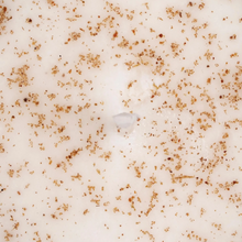 Load image into Gallery viewer, UpCircle chai latte soy wax candle. Vegan and cruelty-free. Image shows a close up of the candle wax.
