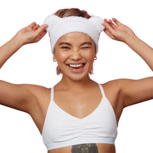 Load image into Gallery viewer, Bear Beauty Botanicals spa headband. Vegan and cruelty-free. Image shows a woman wearing the headband. Available at Lovethical along with plenty of other vegan and cruelty-free beauty products, makeup, make up, toiletries and cosmetics for all your gift and present needs. 
