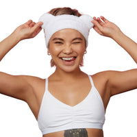 Bear Beauty Botanicals spa headband. Vegan and cruelty-free. Image shows a woman wearing the headband. Available at Lovethical along with plenty of other vegan and cruelty-free beauty products, makeup, make up, toiletries and cosmetics for all your gift and present needs. 
