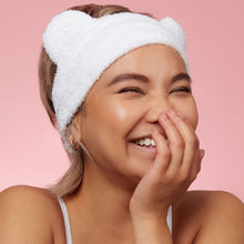 Load image into Gallery viewer, Bear Beauty Botanicals spa headband. Vegan and cruelty-free. Image shows a woman wearing the headband. Available at Lovethical along with plenty of other vegan and cruelty-free beauty products, makeup, make up, toiletries and cosmetics for all your gift and present needs. 
