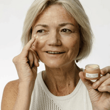 Load image into Gallery viewer, UpCircle eye cream. Image shows a woman putting on the eye cream. Vegan and cruelty-free. Available at Lovethical along with plenty of other vegan and cruelty-free beauty products, makeup, make up, toiletries and cosmetics for all your gift and present needs. 
