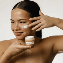 Load image into Gallery viewer, UpCircle face moisturiser cream. Image shows a woman using the cream. Vegan and cruelty-free. Available at Lovethical along with plenty of other vegan and cruelty-free beauty products, makeup, make up, toiletries and cosmetics for all your gift and present needs. 
