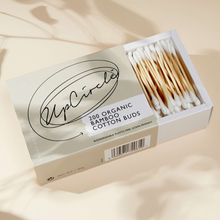 Load image into Gallery viewer, UpCircle organic cotton buds. Vegan and cruelty-free. Image shows an open packet of the cotton buds.
