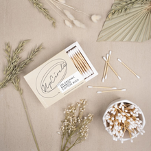 Load image into Gallery viewer, UpCircle organic cotton buds. Vegan and cruelty-free. Image shows an open packet surrounded by beautfiful greenery.
