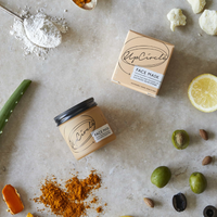 UpCircle face mask. Vegan and cruelty-free. Image shows the face mask surrounded by its ingredients.