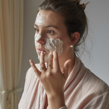 Load image into Gallery viewer, UpCircle face mask. Vegan and cruelty-free. Image shows a woman putting the face mask on her skin.
