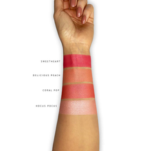 Load image into Gallery viewer, London Copyright Blush Palette colour swatches on arm. Vegan and cruelty-free. Available at Lovethical along with plenty of other vegan and cruelty-free beauty products, makeup, make up, toiletries and cosmetics for all your gift and present needs. 
