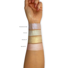 Load image into Gallery viewer, London Copyright Highlight Palette colour swatches on arm. Vegan and cruelty-free. Available at Lovethical along with plenty of other vegan and cruelty-free beauty products, makeup, make up, toiletries and cosmetics for all your gift and present needs. 
