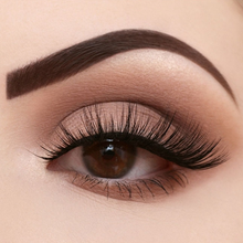 Load image into Gallery viewer, London Copyright Eyelashes - West End on model&#39;s eye. Vegan and cruelty-free. Available at Lovethical along with plenty of other vegan and cruelty-free beauty products, makeup, make up, toiletries and cosmetics for all your gift and present needs. 

